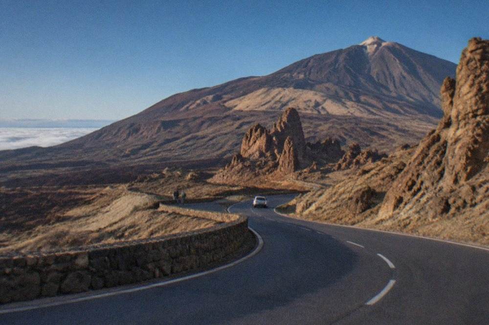 A road winding through the volcanic landscape of Teide National Park