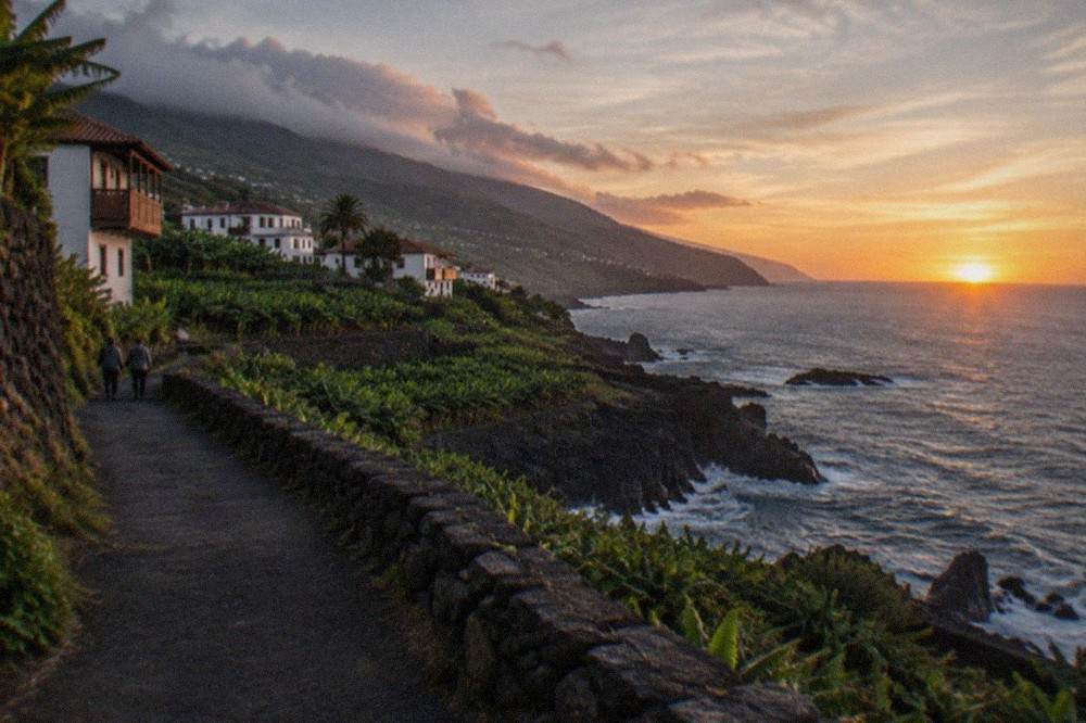 Sunset over the sea on Tenerife's south coast seen from a coastal path