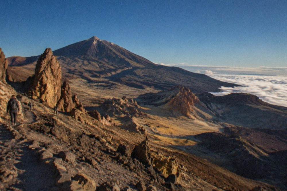 Mount Teide rising above a sea of clouds inside Teide National Park