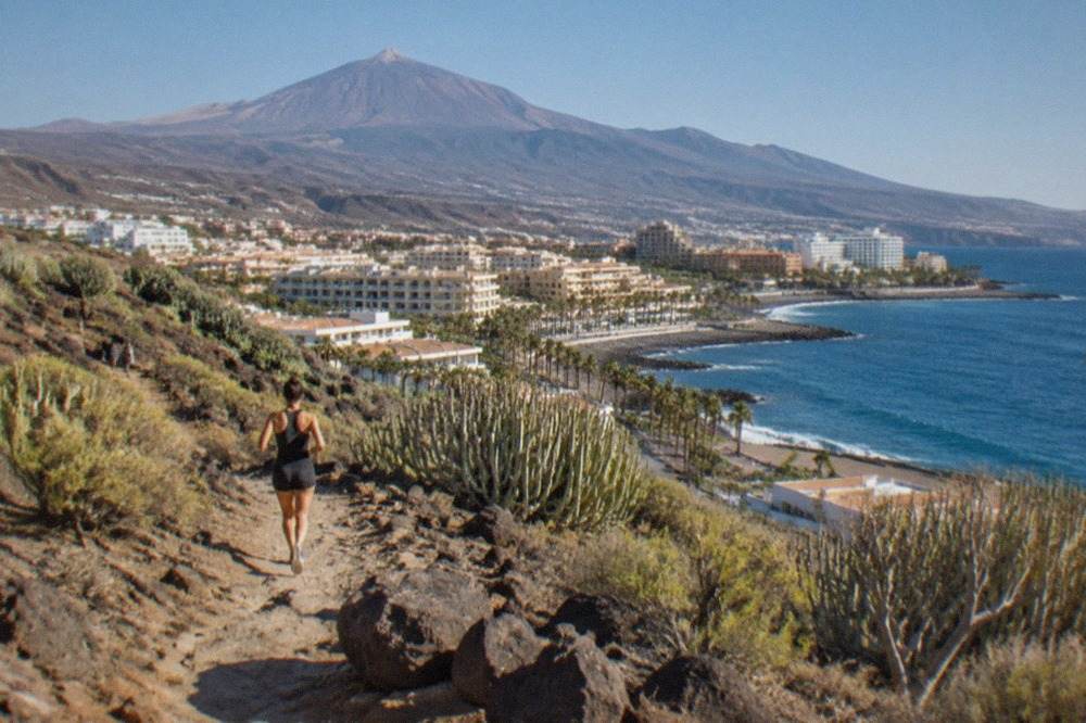 A view over Tenerife rooftops towards Mount Teide under a clear sky