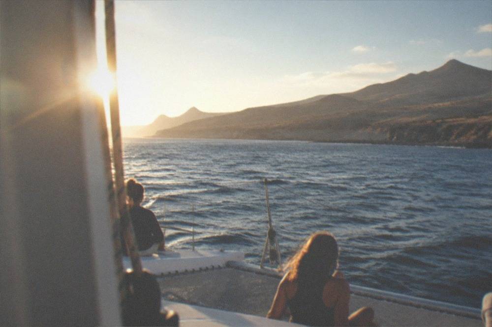 Catamaran sailing on open water off Tenerife's south coast