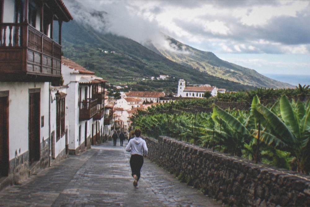 Traditional houses with wooden balconies and red roofs in a northern Tenerife town