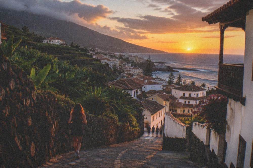 Sunset over the rooftops and seafront of Puerto de la Cruz