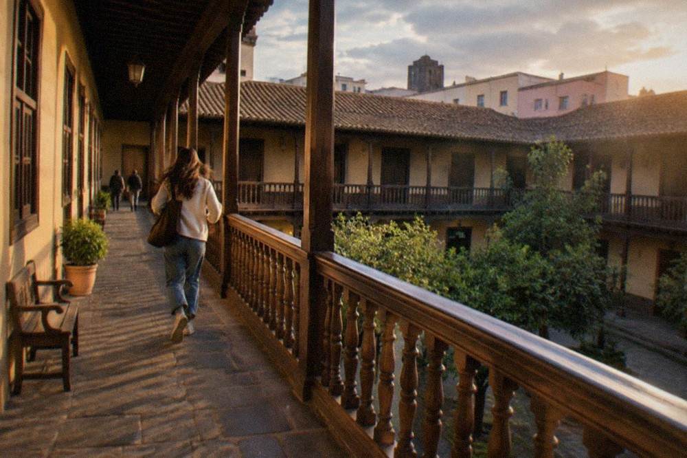 Colonial courtyard building with wooden balconies in La Laguna near Santa Cruz