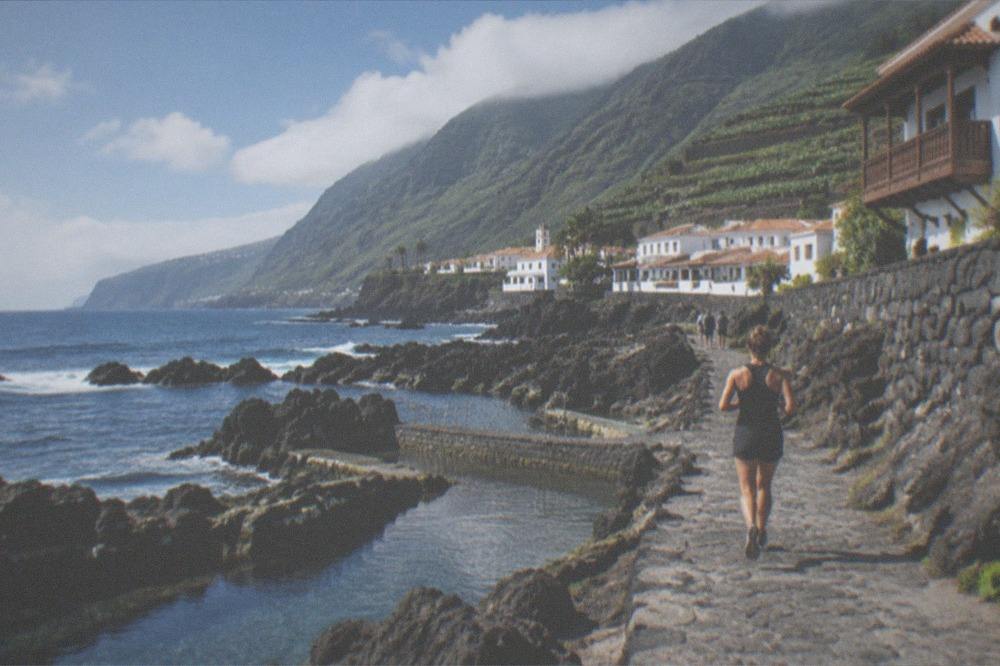 Rock pools and dark volcanic rock on the seafront at Garachico