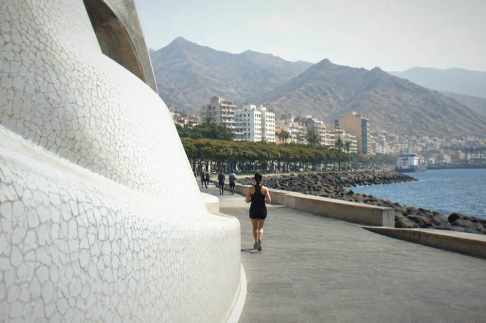 Close view of the white trencadis tile surface of the Auditorio