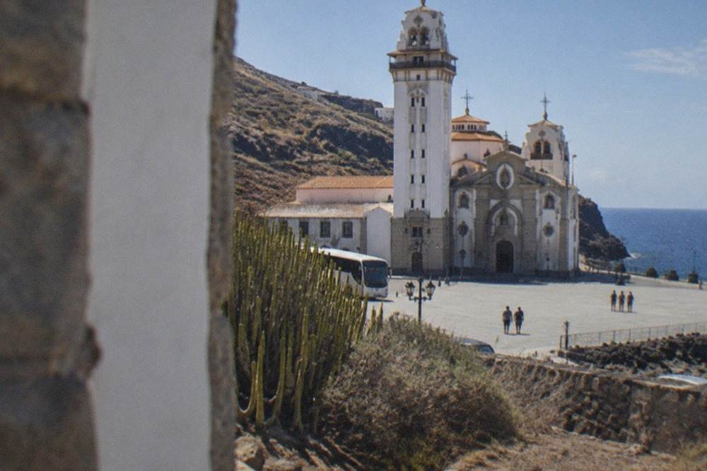 The white Basilica of Candelaria beside a wide plaza on the coast of Tenerife