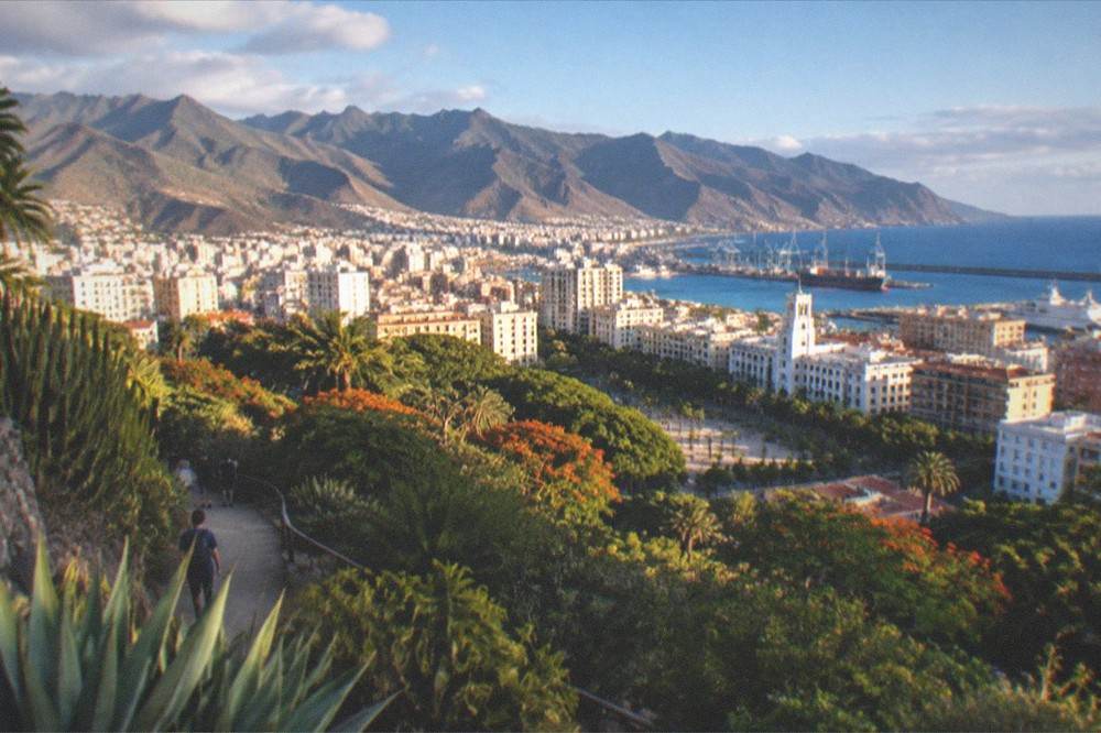 A wide view of Santa Cruz de Tenerife with the Anaga mountains in the distance