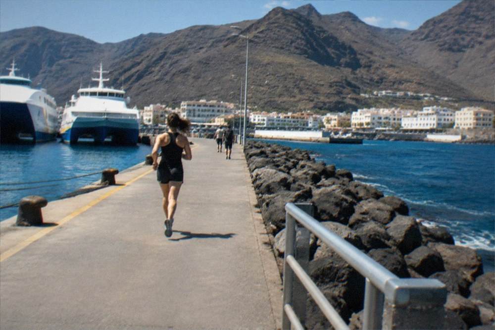 Two Canary Islands ferries moored side by side at a Tenerife port