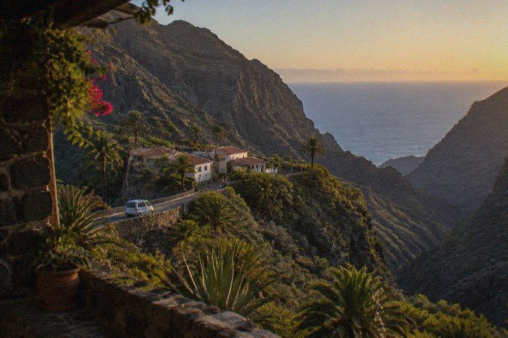 The village of Masca perched on a rocky ridge with terraced slopes falling towards the sea
