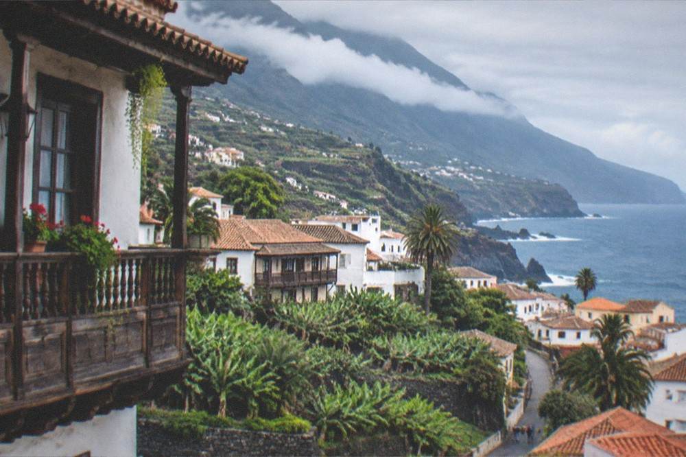 A wooden balcony on a historic building in a northern Tenerife town