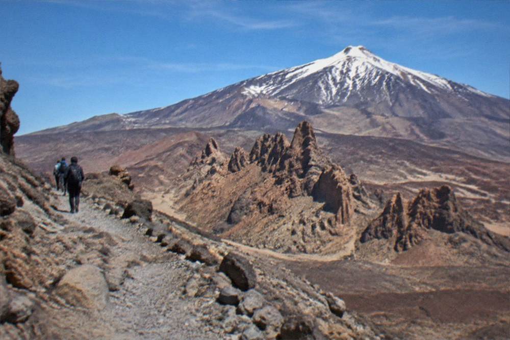 Snow patches on the upper slopes of Mount Teide in winter sunshine