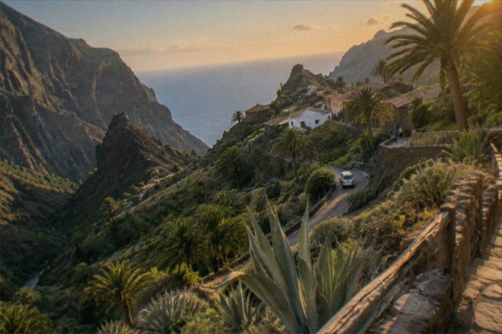 The village of Masca nestled among steep green ravines in summer