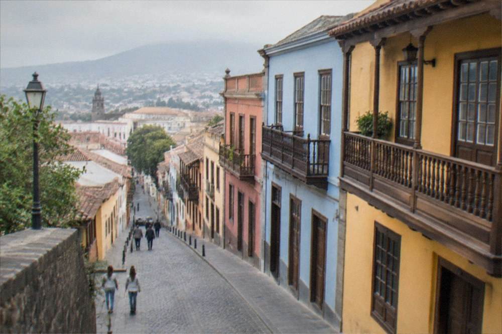 Colourful colonial facades along a cobbled street in La Laguna old town