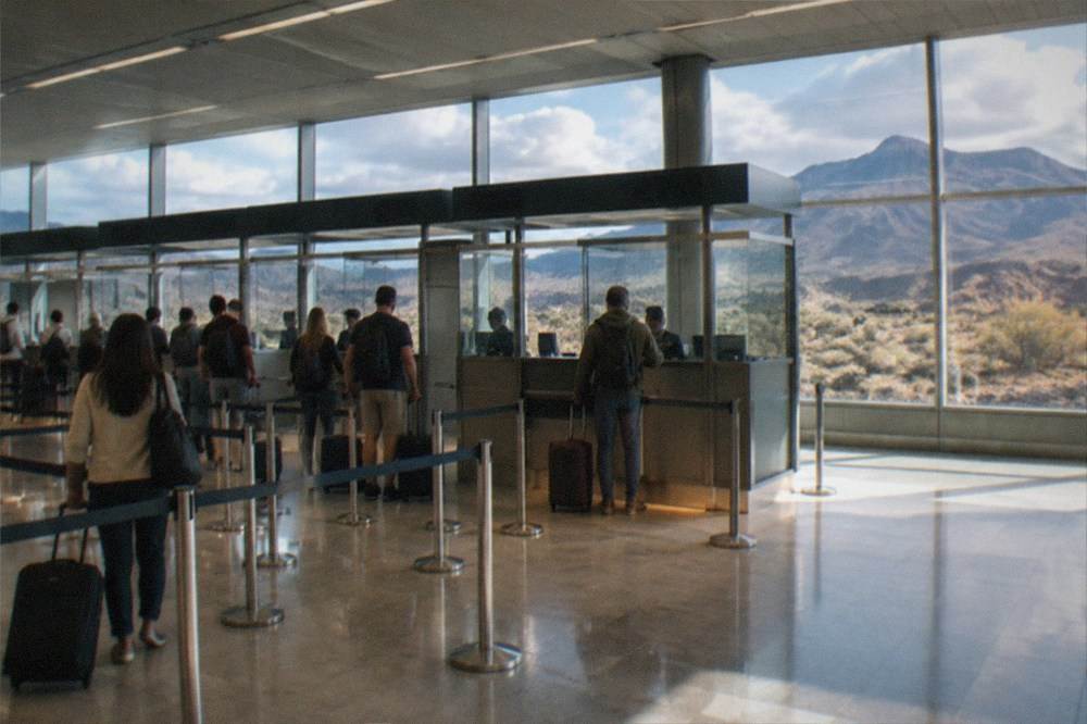 Passport control desks at an airport arrivals hall