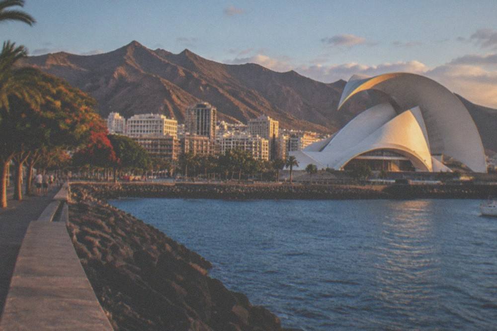 The white trencadis shell of the Auditorio de Tenerife against the evening sky in Santa Cruz
