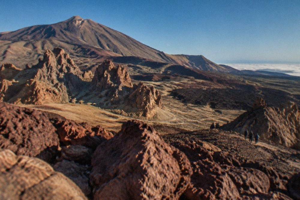 A view over the volcanic slopes of Teide National Park with reddish rock formations