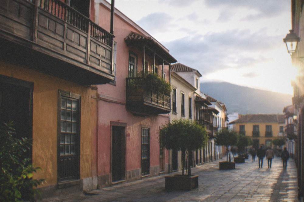 A colourful colonial street with wooden balconies in a Canary island town