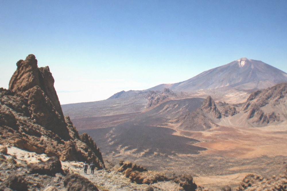 Volcanic rock formations under a clear sky in Teide National Park