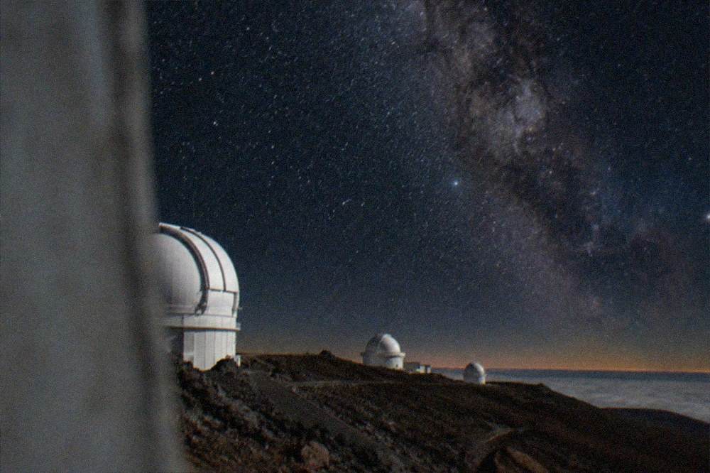 The white domes of the Teide Observatory on the Izana ridge in daylight